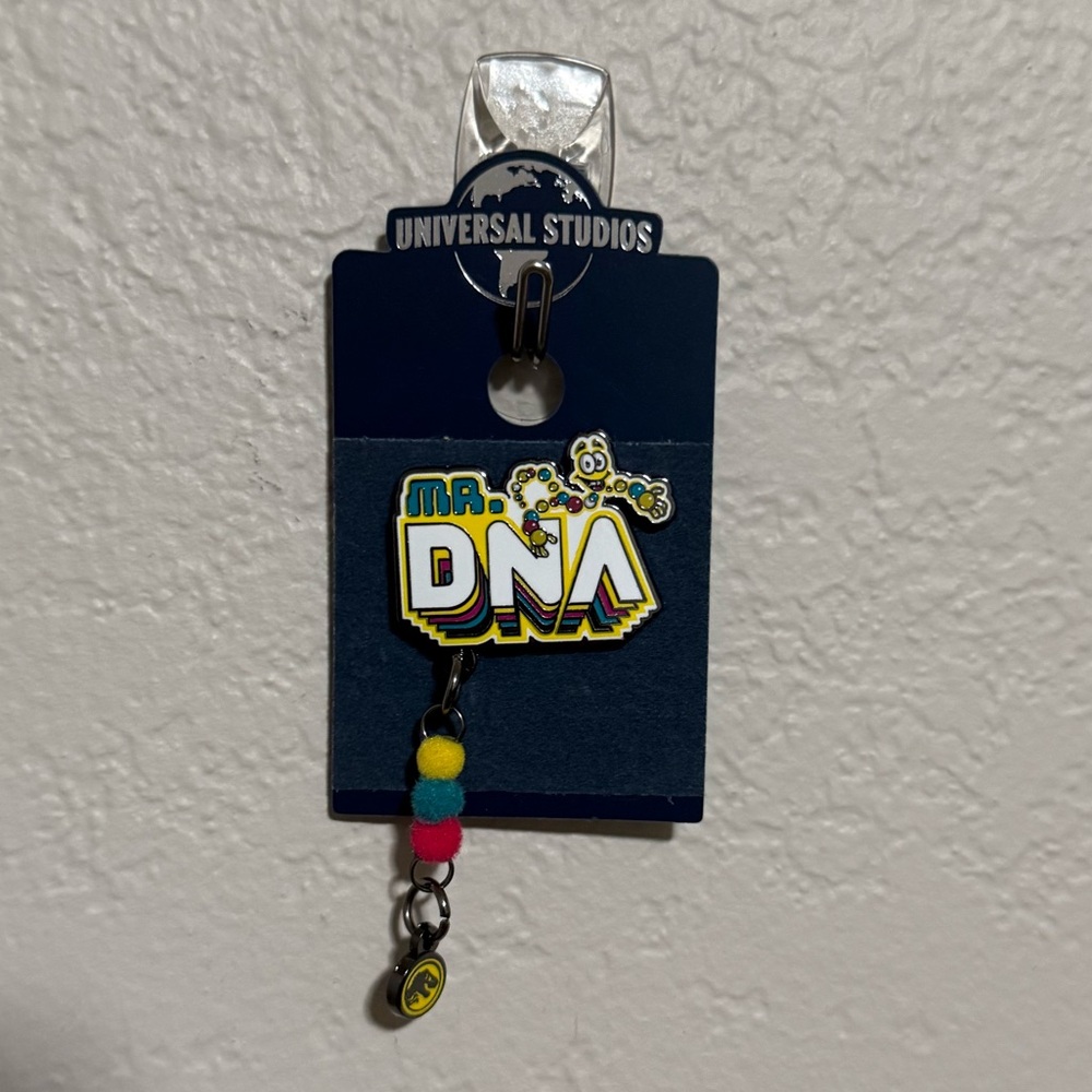 Hard to Find Universal Studios Jurassic Park Mr. DNA Pin
